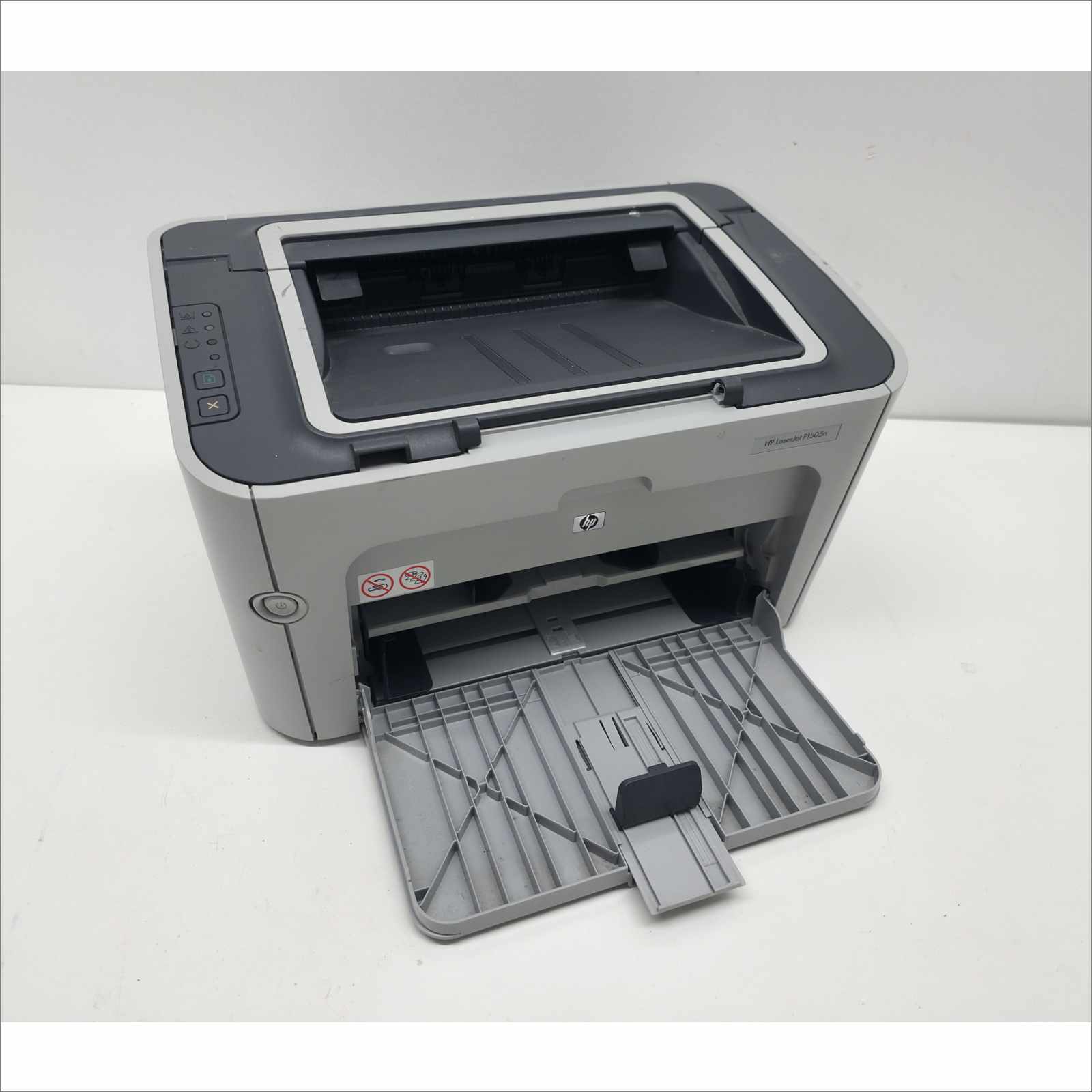This HP LaserJet P1505n Workgroup Compact Monochrome Laser Printer (PN# CB413A) is guaranteed to be in good working and physical condition with normal cosmetic wear from prior use. It was tested with the following notes from our testing technician: Printer powered on successfully. Network and USB connections tested – data transfer verified. Print function verified (print quality as pictured). Page Count (PGC#): Not specified. Features & Specs: Model: HP LaserJet P1505n Product Number (PN#): CB413A Serial Number: VND3C40601 Printing Technology: Monochrome Laser Print Speed: Up to 24 ppm Resolution: 600 × 600 dpi (HP FastRes 1200) Processor: 266 MHz Memory: 2 MB Connectivity: USB 2.0, Ethernet Paper Input Capacity: 250 sheets Output Tray Capacity: 125 sheets Duty Cycle: Up to 8,000 pages/month Dimensions (W × H × D): 14.6″ × 9.6″ × 9.5″ Weight: 13 lbs Includes: 1x HP LaserJet P1505n Workgroup Compact Monochrome Laser Printer Does Not Include: Toner cartridge Power cable or USB cable Any other accessories not listed or pictured above Shipping Data: Unit dimensions (W × H × D): 14.6″ × 9.6″ × 9.5″ Unit weight: 13 lbs Shipping dimensions (W × H × D): 20.6″ × 15.6″ × 15.5″ Estimated shipping weight: 15 lbs ⚠️ Condition Note: Tested and functional. Toner and cables not included. ⚠️ Shipping Note: Toner cartridges are not shipped due to leakage and spill risks during transit. Buyers should install their own toner upon setup.